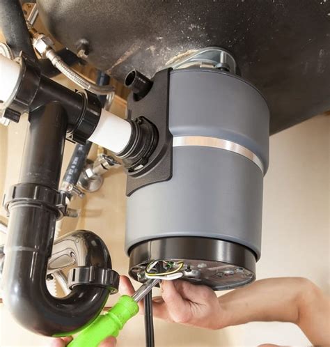 garbage disposal dripping from bottom|Garbage Disposal Leaking from Bottom: Quick Fix Solutions!